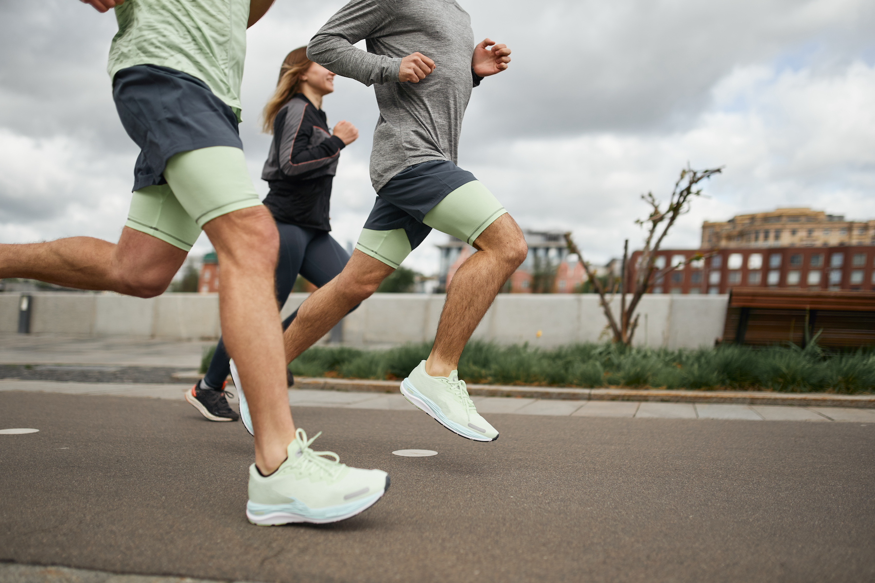 Shot of men's calves while running