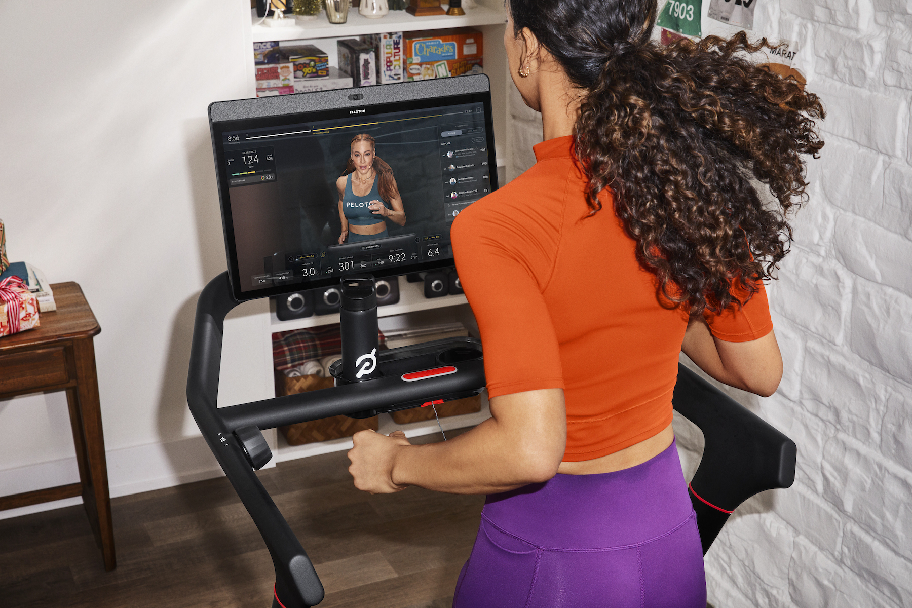 Peloton Tread with a person running at high speed.