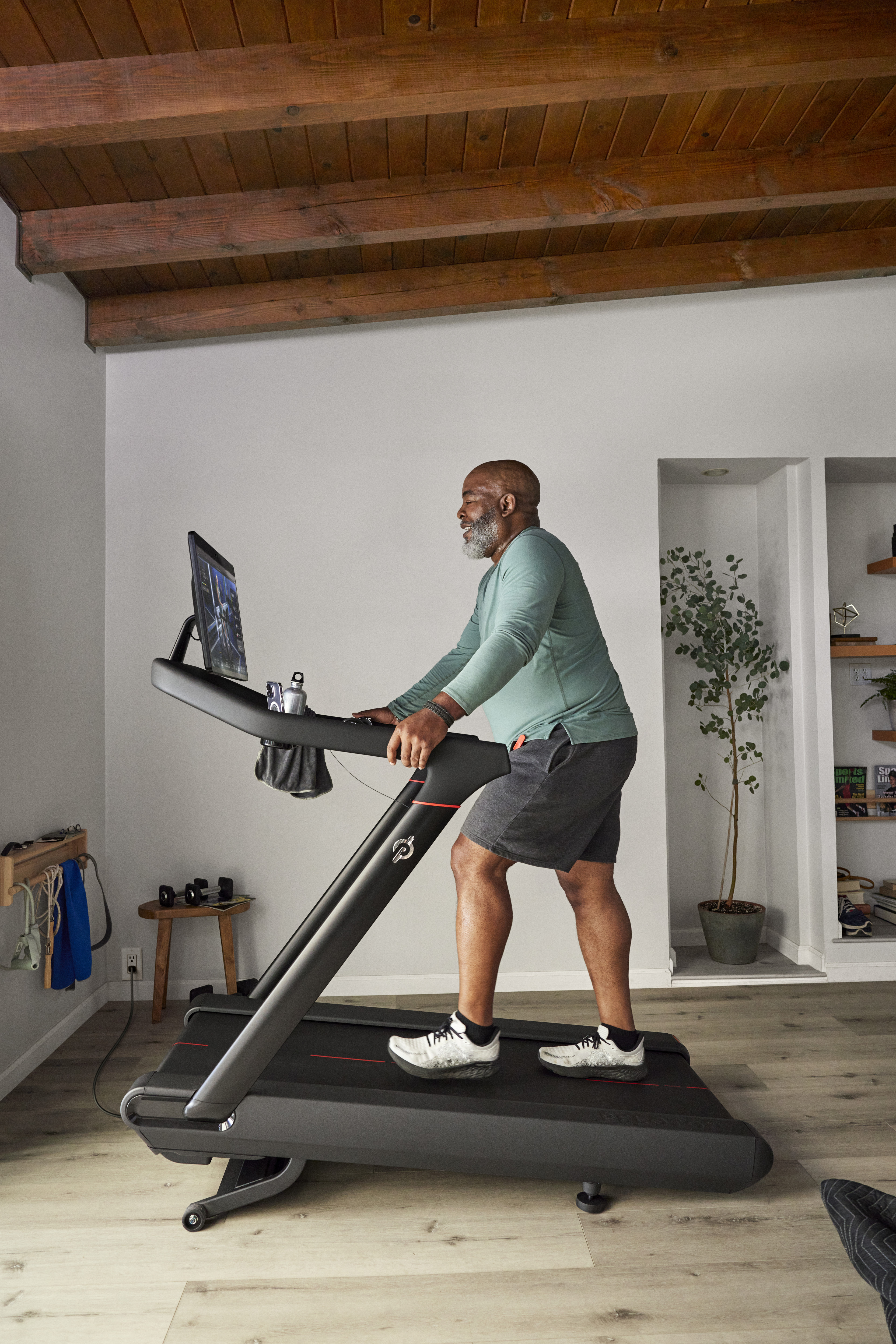 Man walks on a Peloton Tread