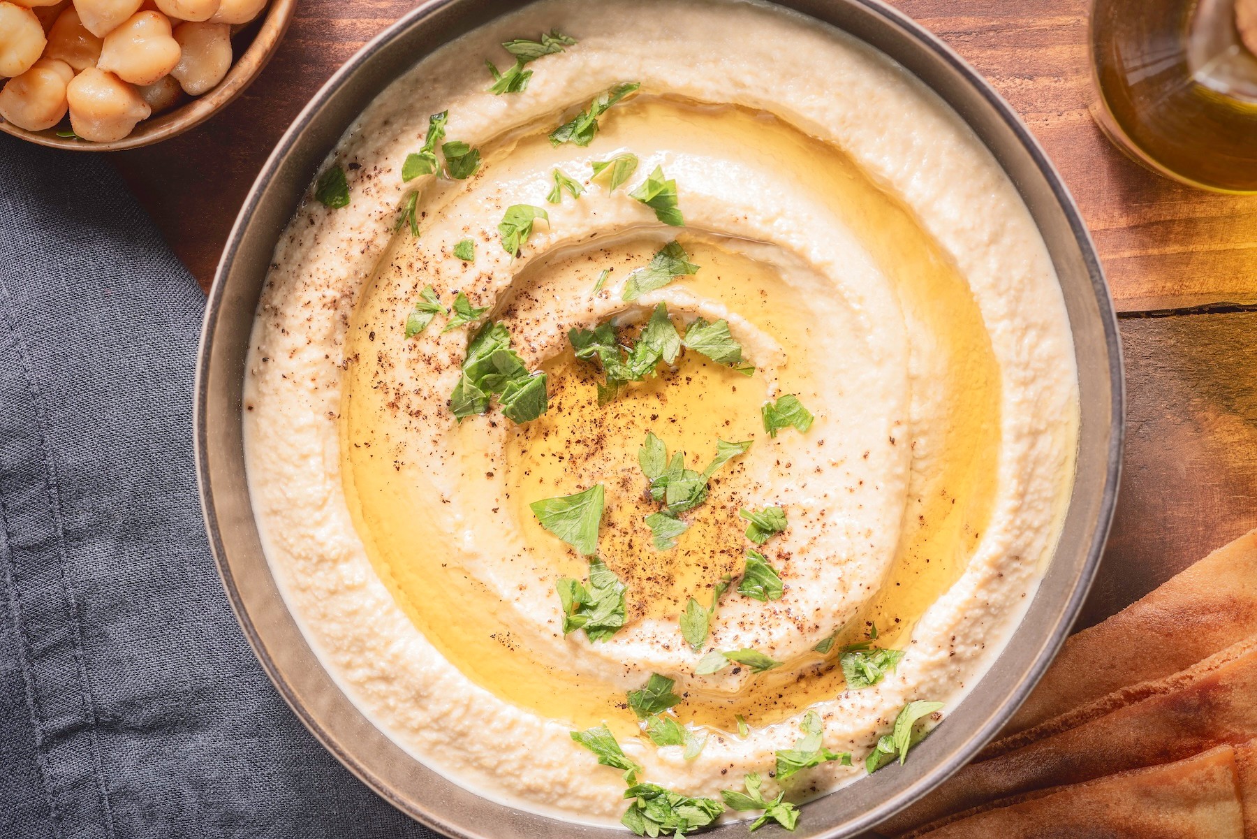 A bowl of creamy hummus.