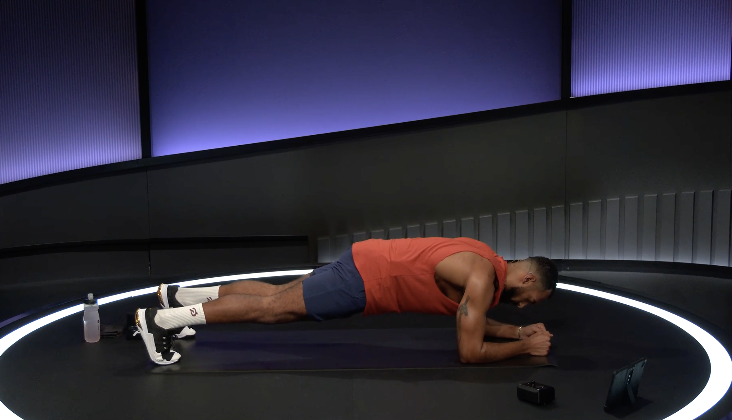 Jermaine Johnson holding forearm plank