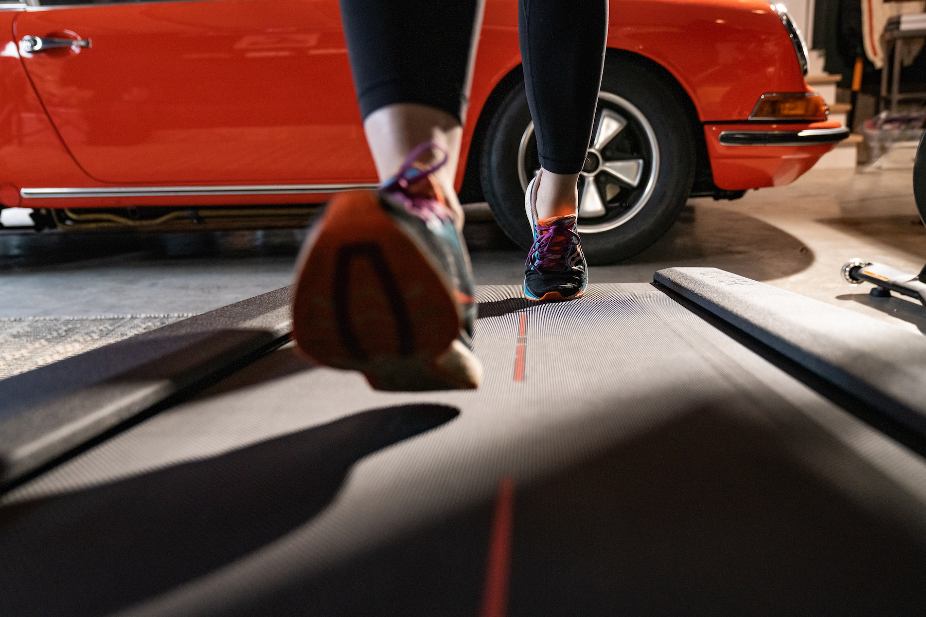 Shot of feet running on a tread, how long does it take to run a mile