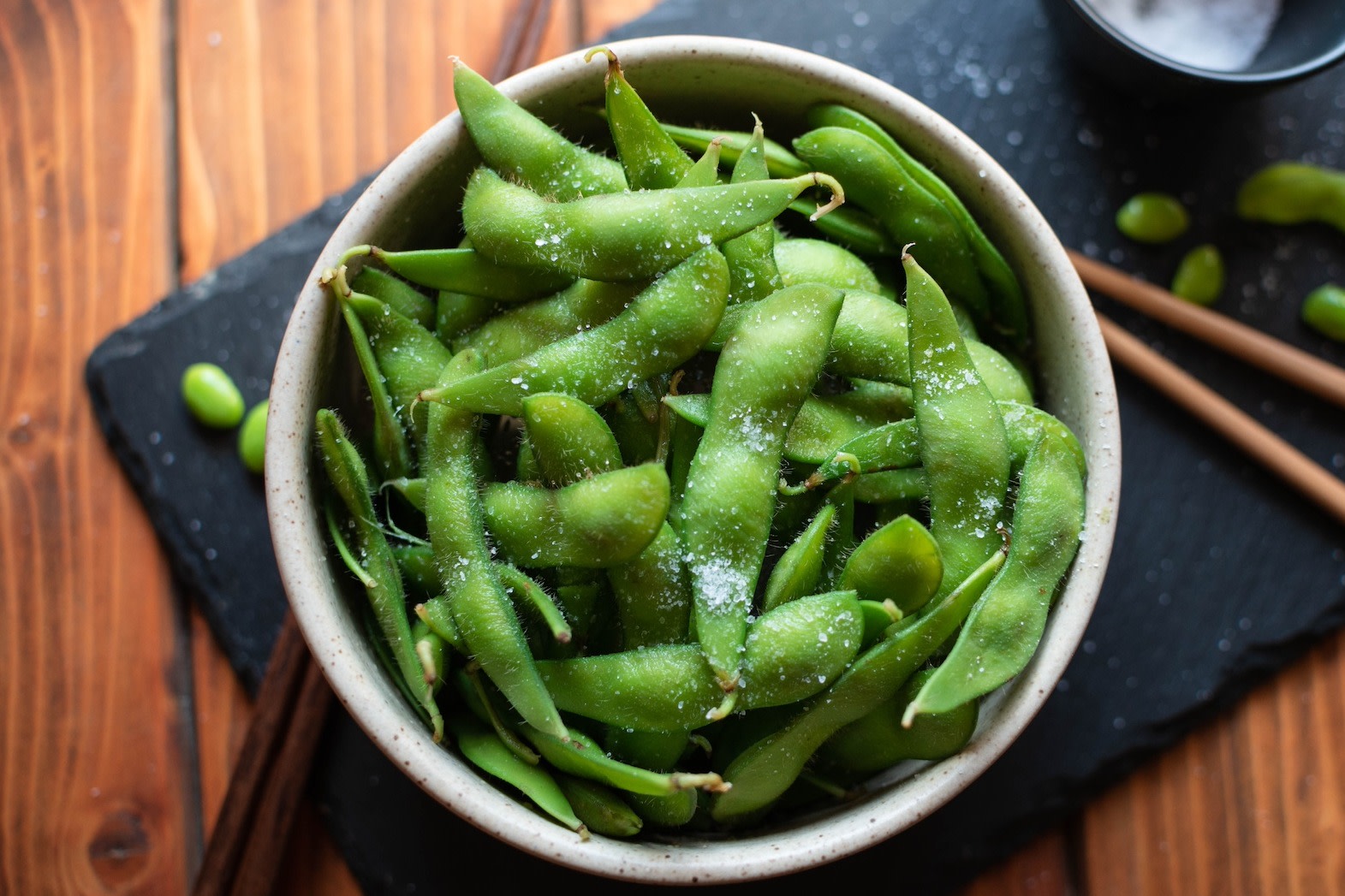 Steamed edamame (a lean protein) with sea salt in a bowl.