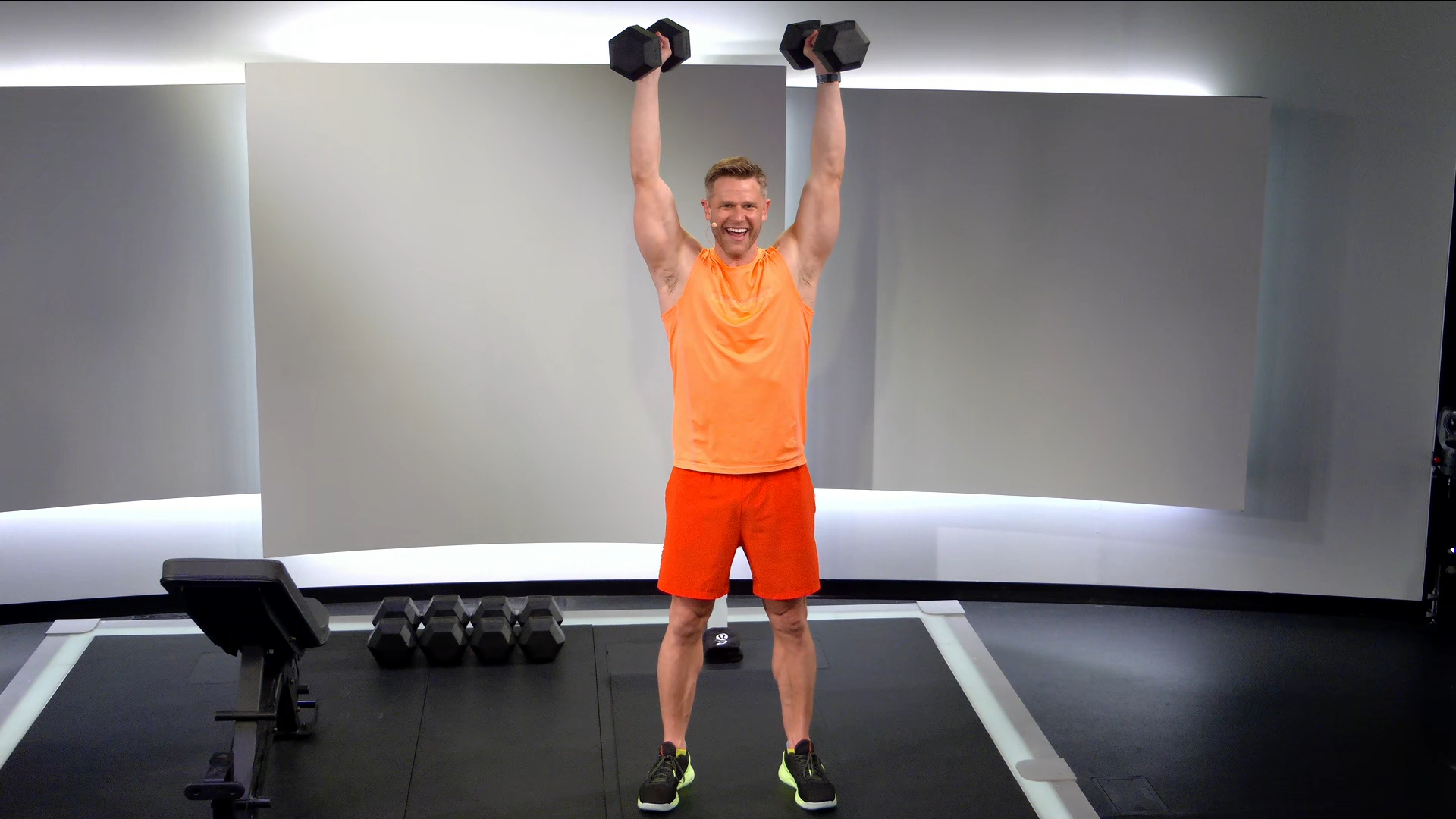 Andy Speer demonstrates upper body strength exercises with dumbbells