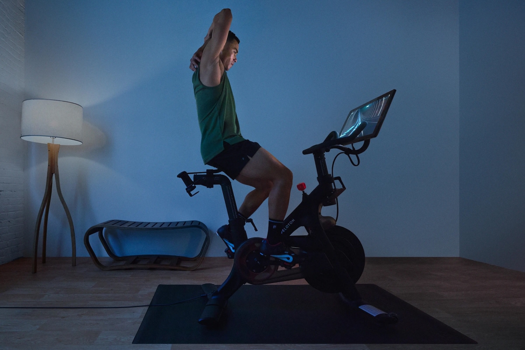 Taking a Peloton class in the dark before going to sleep