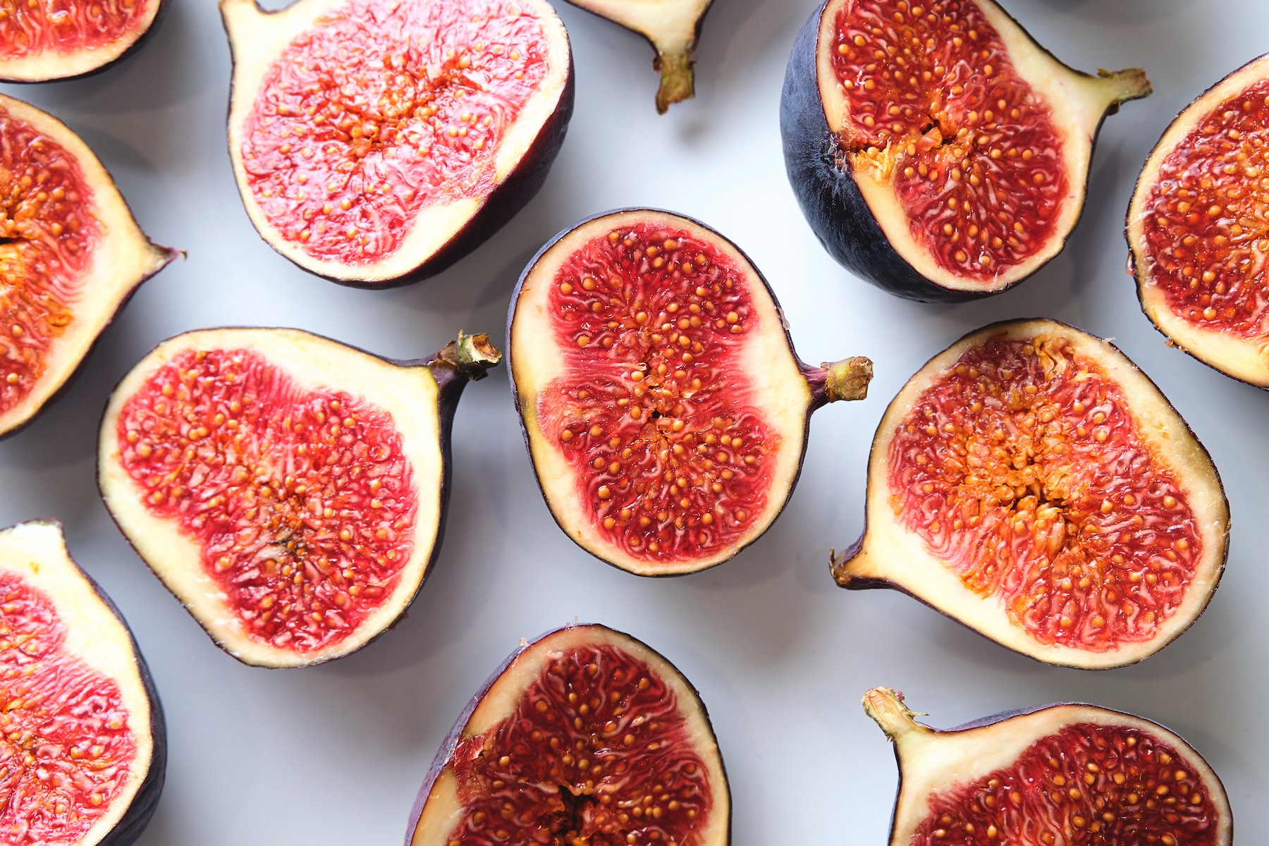 Fresh figs cut in half.
