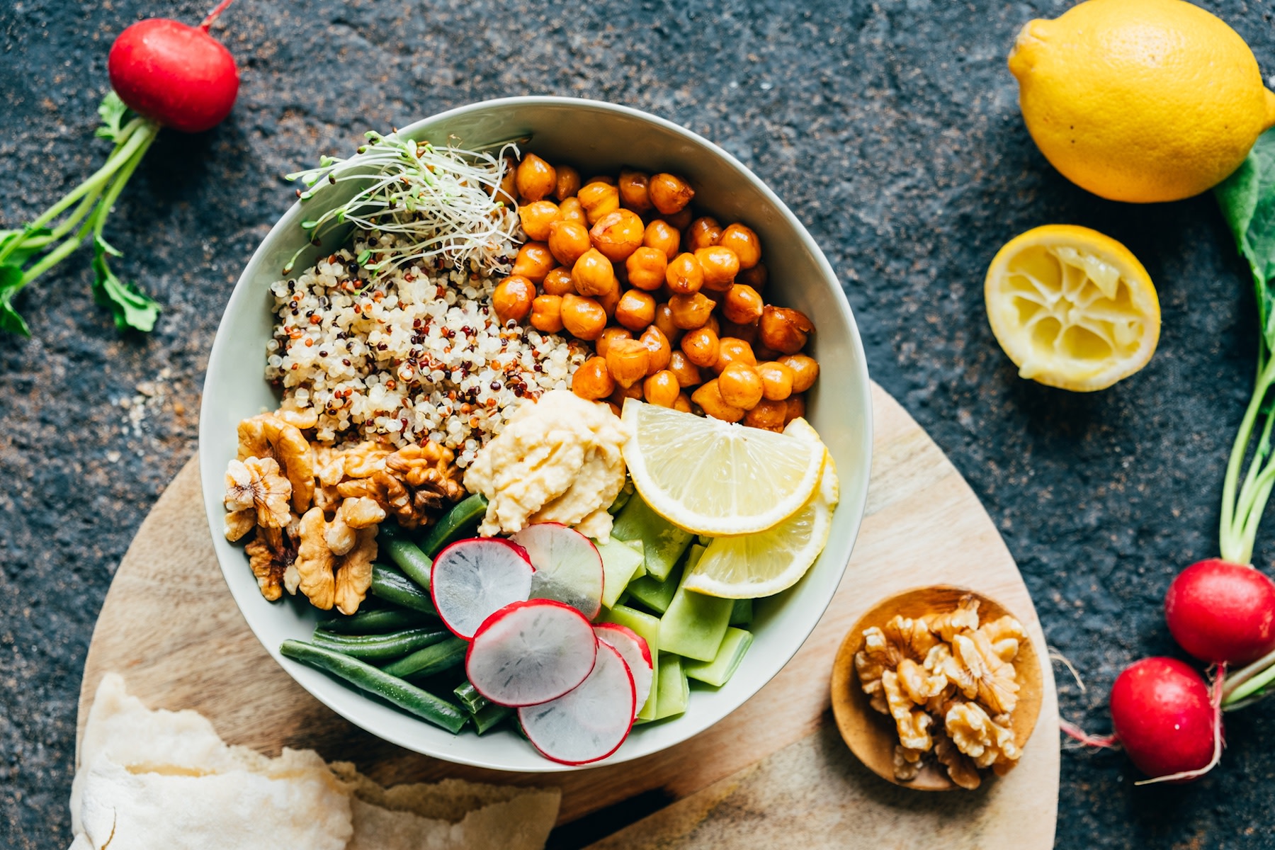 A nourishing bowl of food with plant-based protein sources like quinoa and chickpeas.