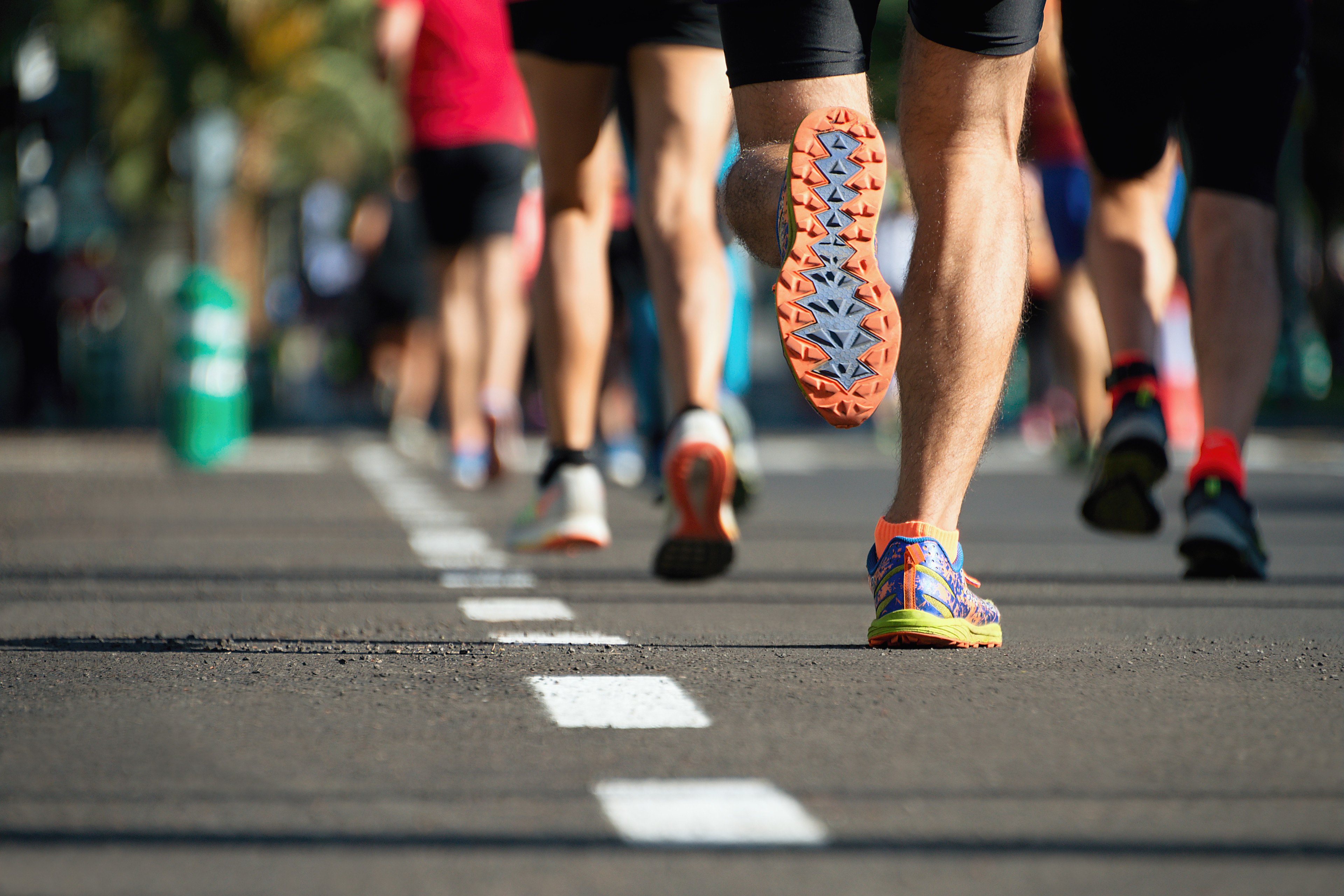 Shot of man running race with bottom of sneaker showing — Getty Images (Pavel1964)