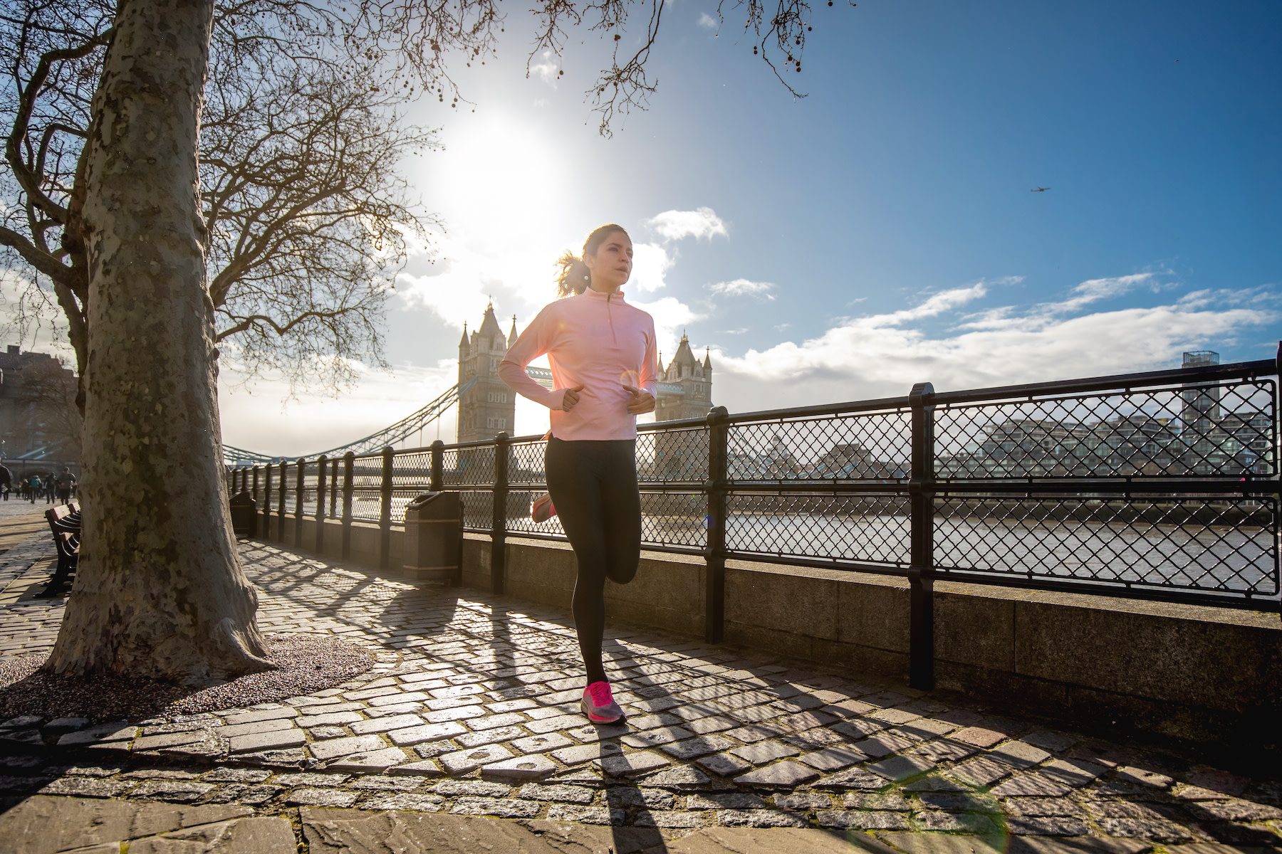 Woman runs outside in London