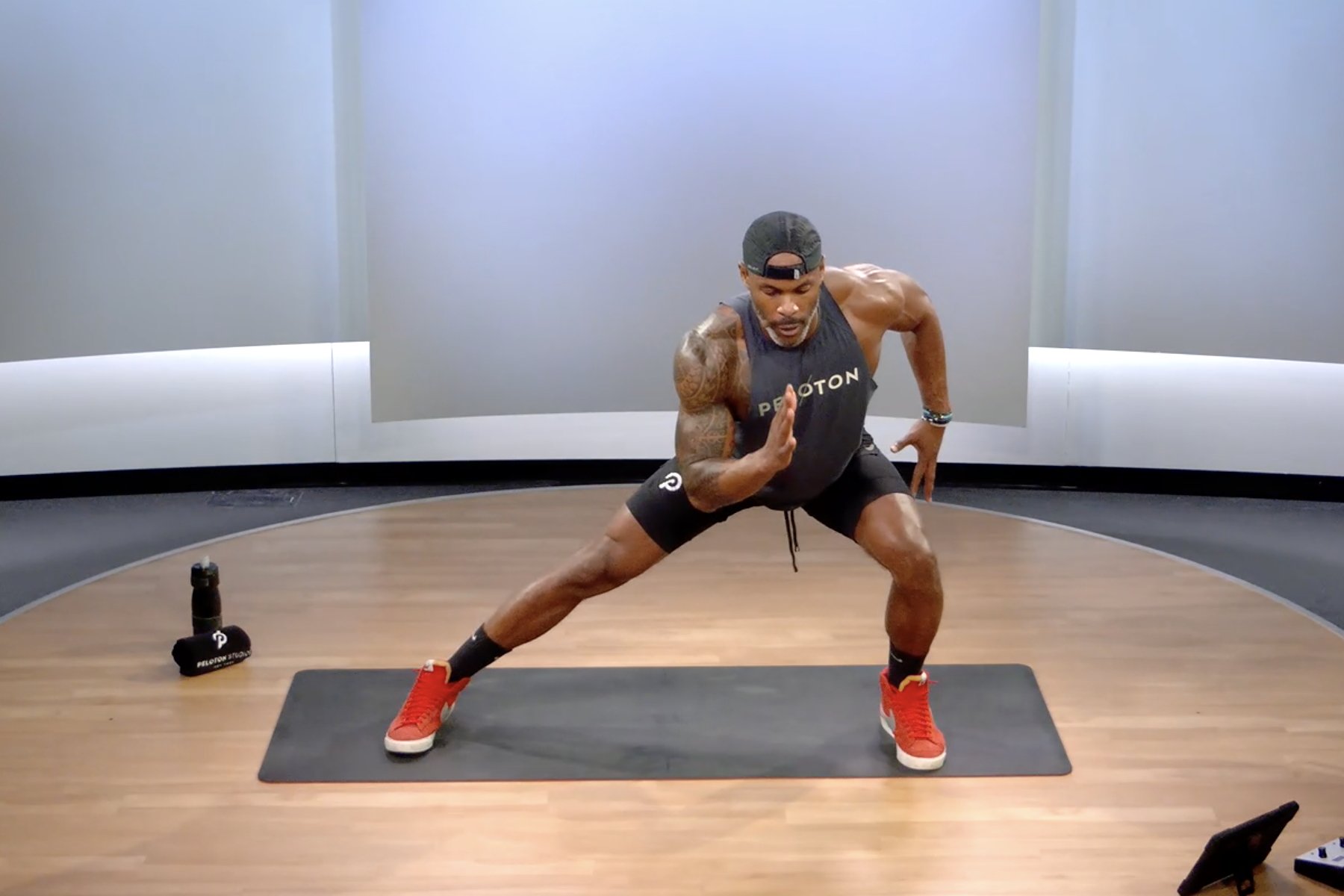 Man does a lateral lunge, a gluteus minimus exercise