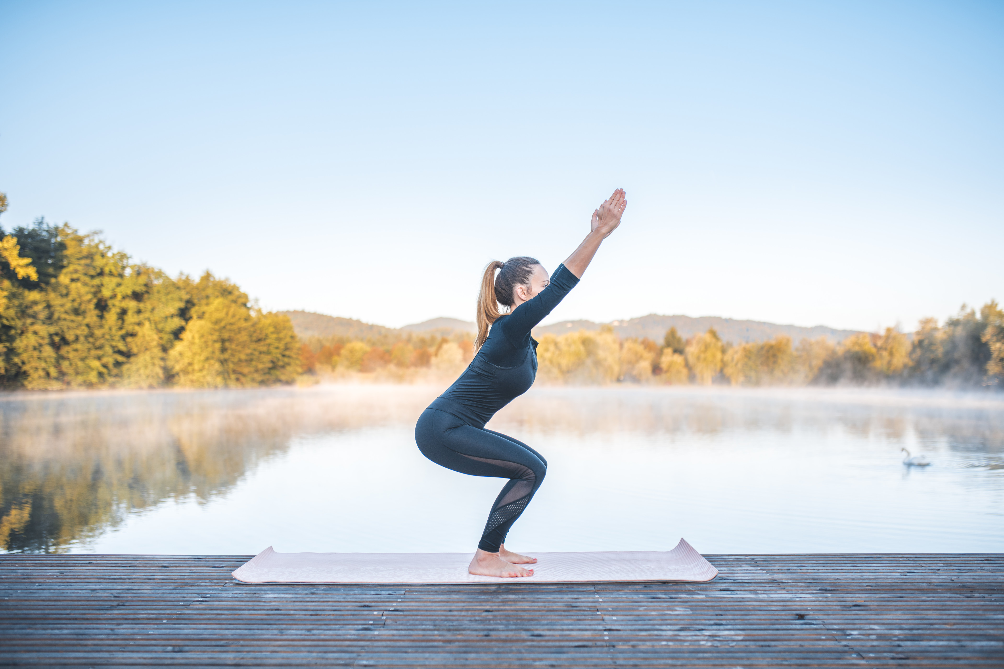 Woman doing chair pose | The Output by Peloton