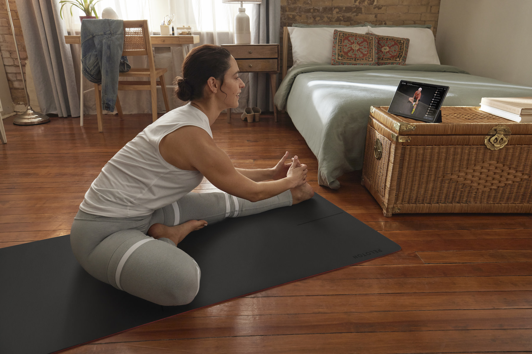 woman stretching after getting out of bed