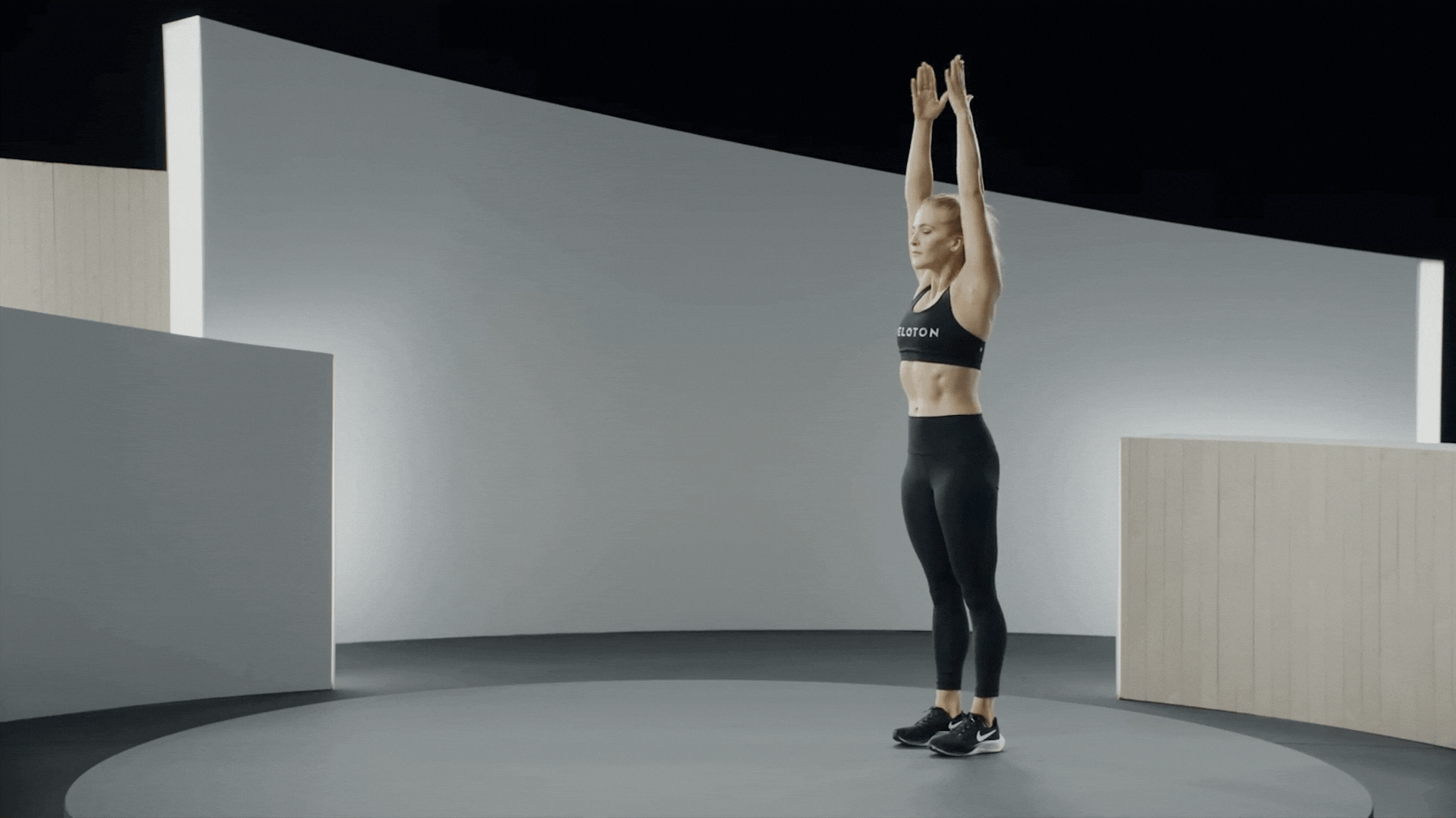 Woman does the inchworm exercise