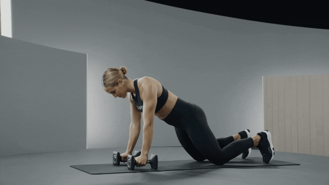Peloton instructor Jess Sims demonstrates a dumbbell renegade row as a strength exercise for tennis.