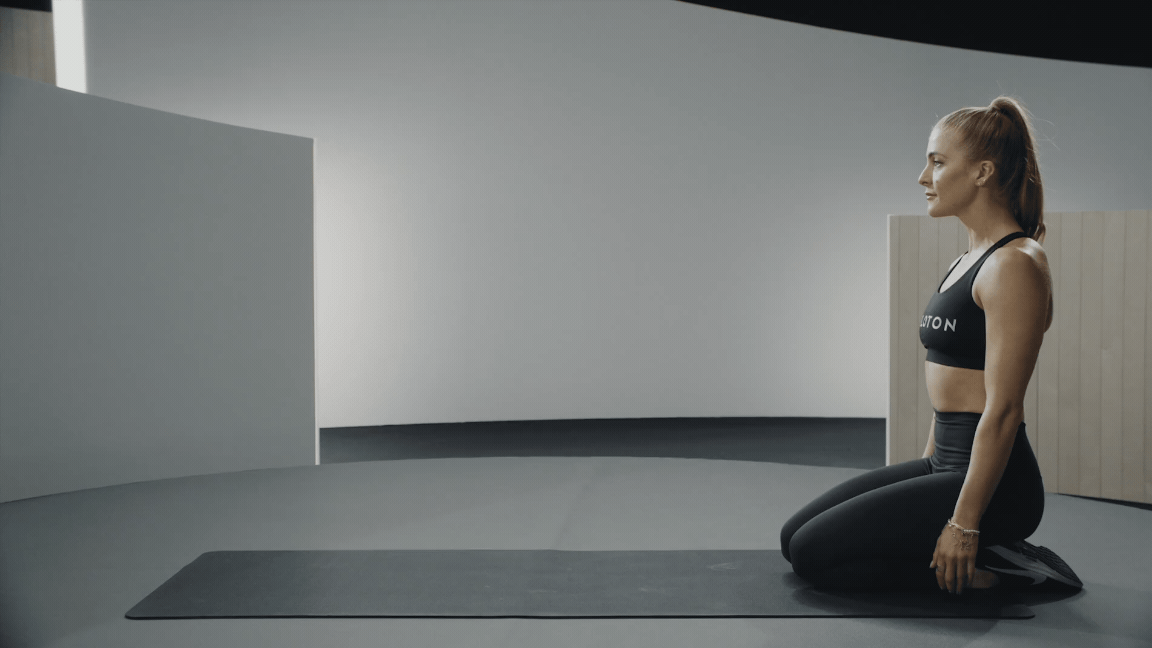 Rebecca Kennedy demonstrates the bear crawl, a rhomboid exercise