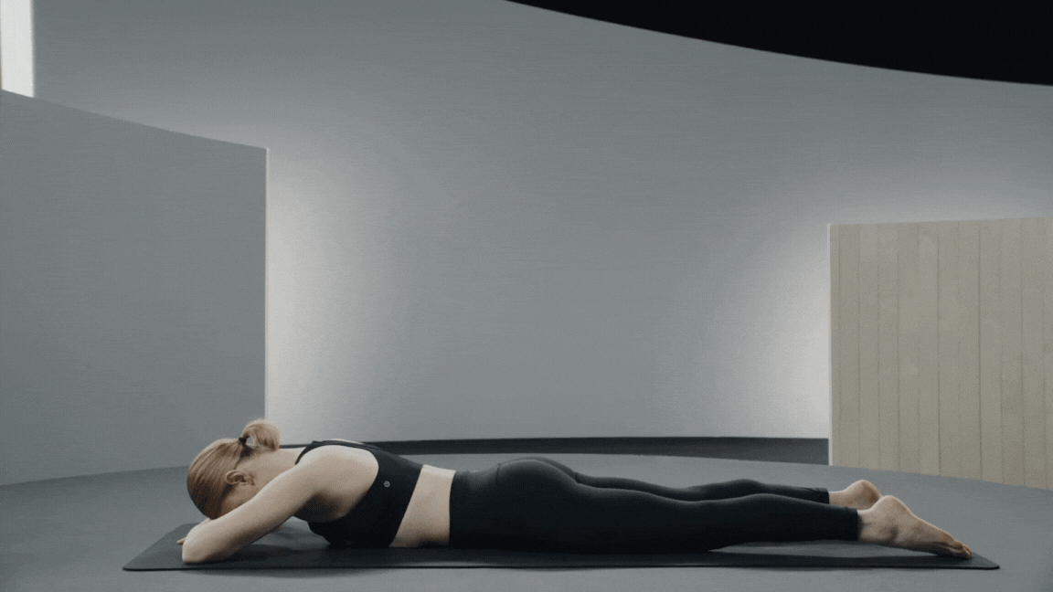 Peloton instructor Anna Greenberg demonstrates Locust Pose in yoga for core strength