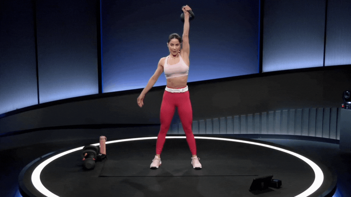 Peloton instructor Assal Arian demonstrates a kettlebell push press with proper form as part of a list of kettlebell shoulder exercises