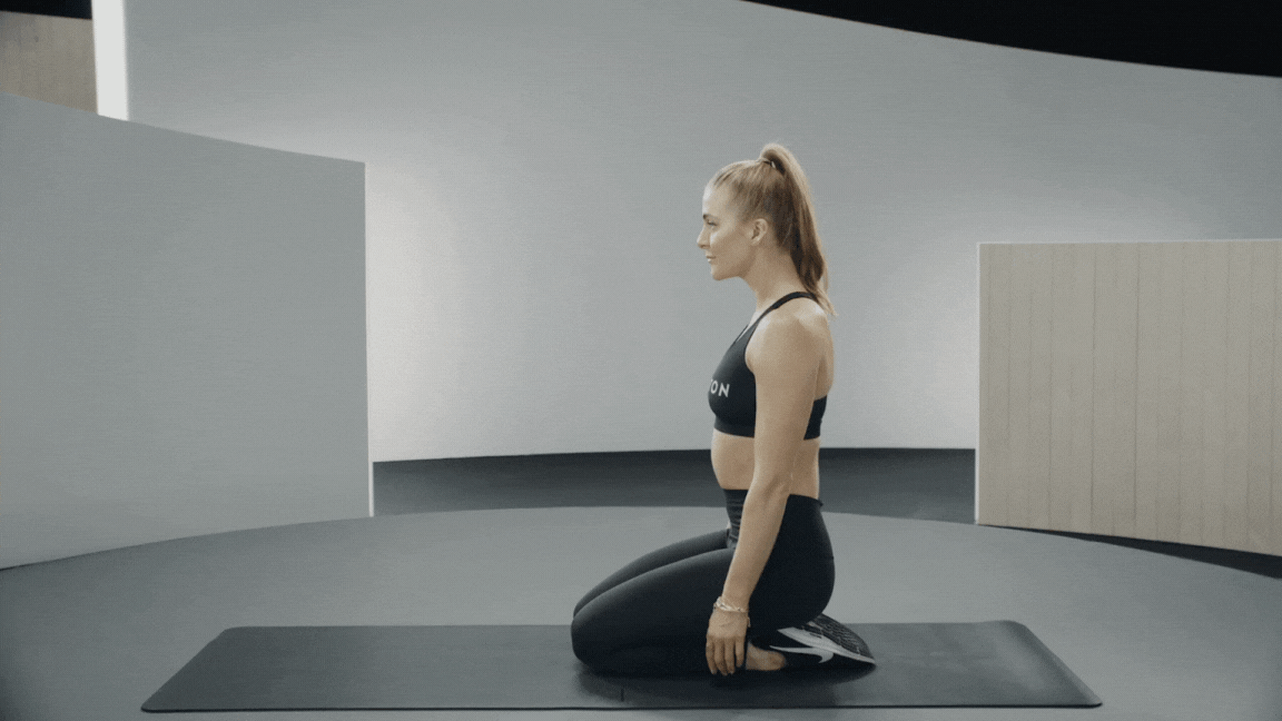 Peloton instructor Rebecca Kennedy demonstrates the high plank exercise with proper form