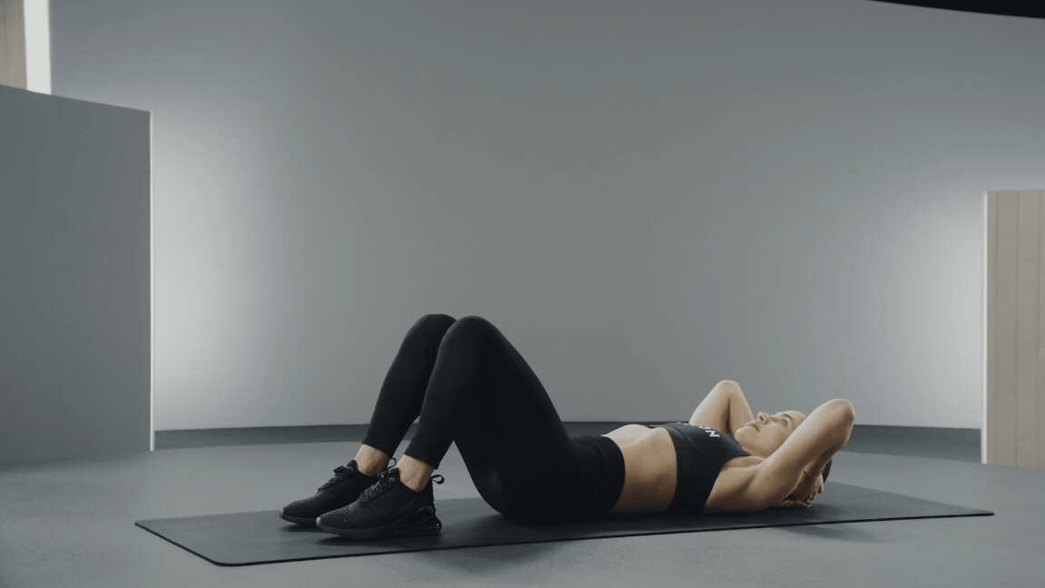 Olivia Amato demonstrates a crunch exercise