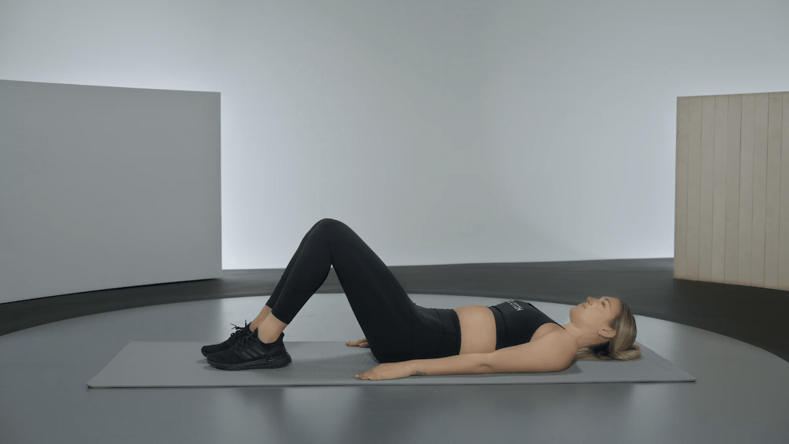 Callie Gullickson demonstrates how to do a butterfly sit up 