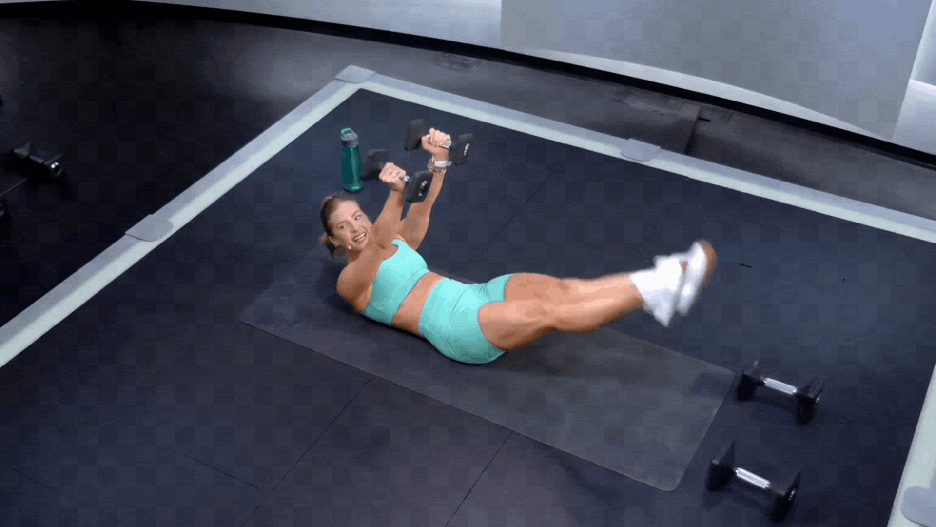 Rebecca Kennedy doing flutter kicks