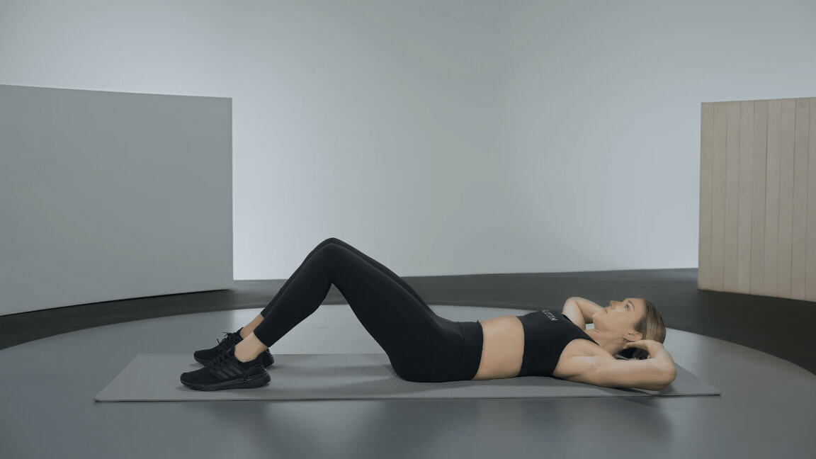 Callie Gullickson demonstrates how to do a sit up