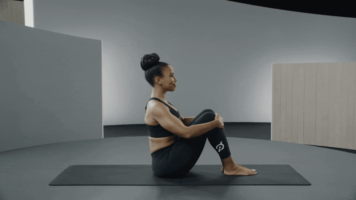 Peloton instructor Chelsea Jackson Roberts demonstrates Savasana as an easy yoga pose.