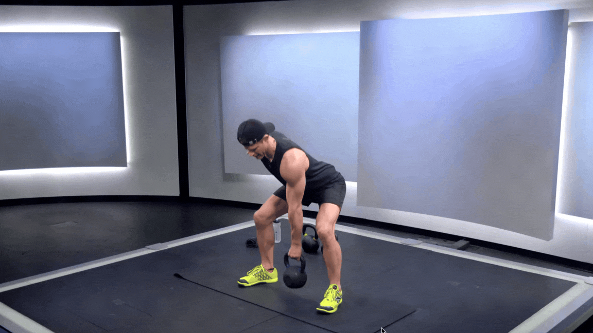 Peloton instructor Andy Speer demonstrates a kettlebell deadlift, a beginner kettlebell exercise