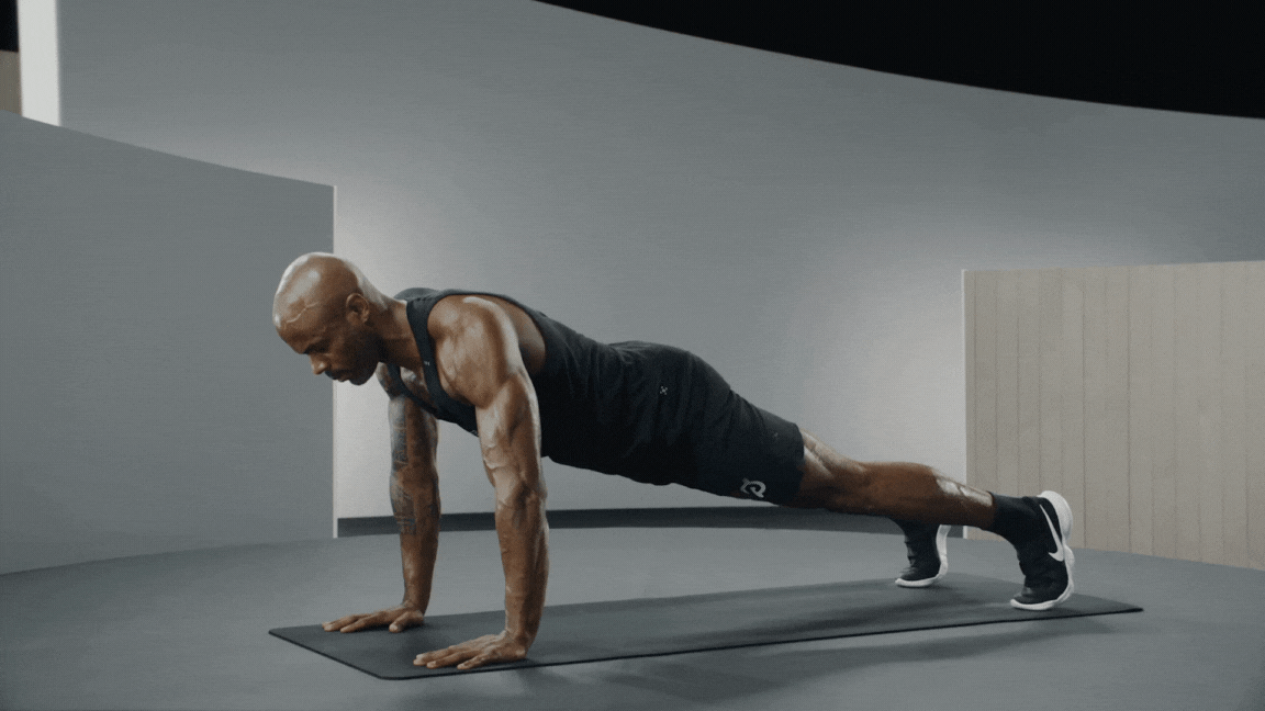 Peloton instructor Adrian Williams demonstrates a push-up with proper form.