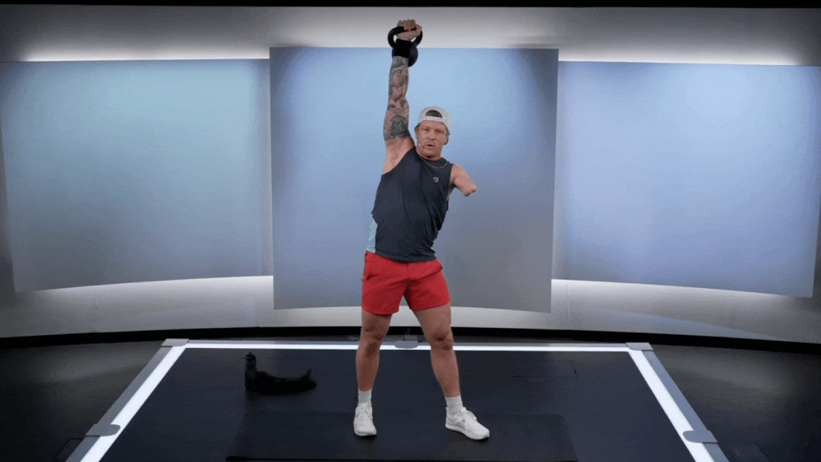 Peloton instructor Logan Aldridge demonstrates a kettlebell windmill as a kettlebell back exercise.
