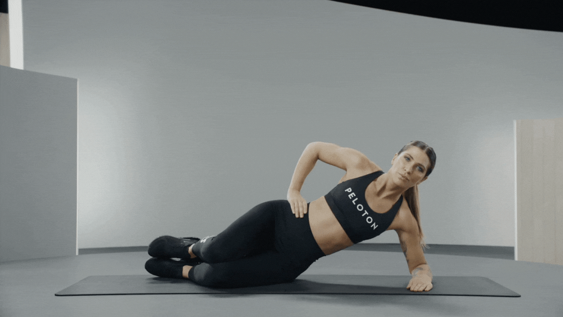 Selena Samuela demonstrates a bridging clamshell exercise 