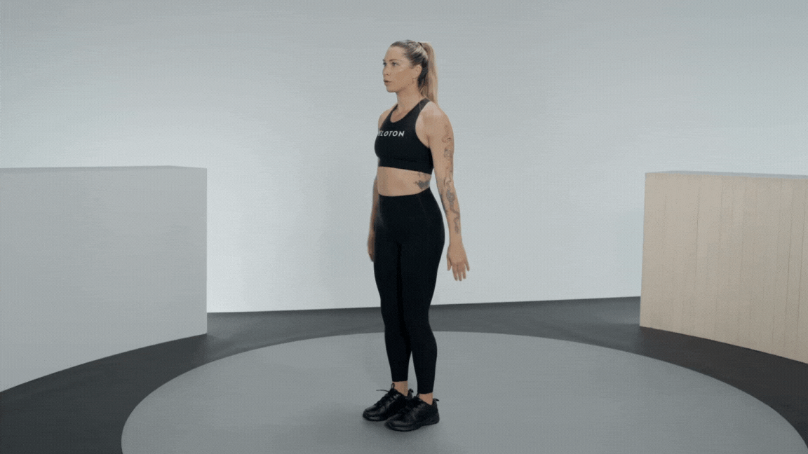 Peloton instructor Selena Samuela demonstrates a single-leg squat quad exercise with proper form.