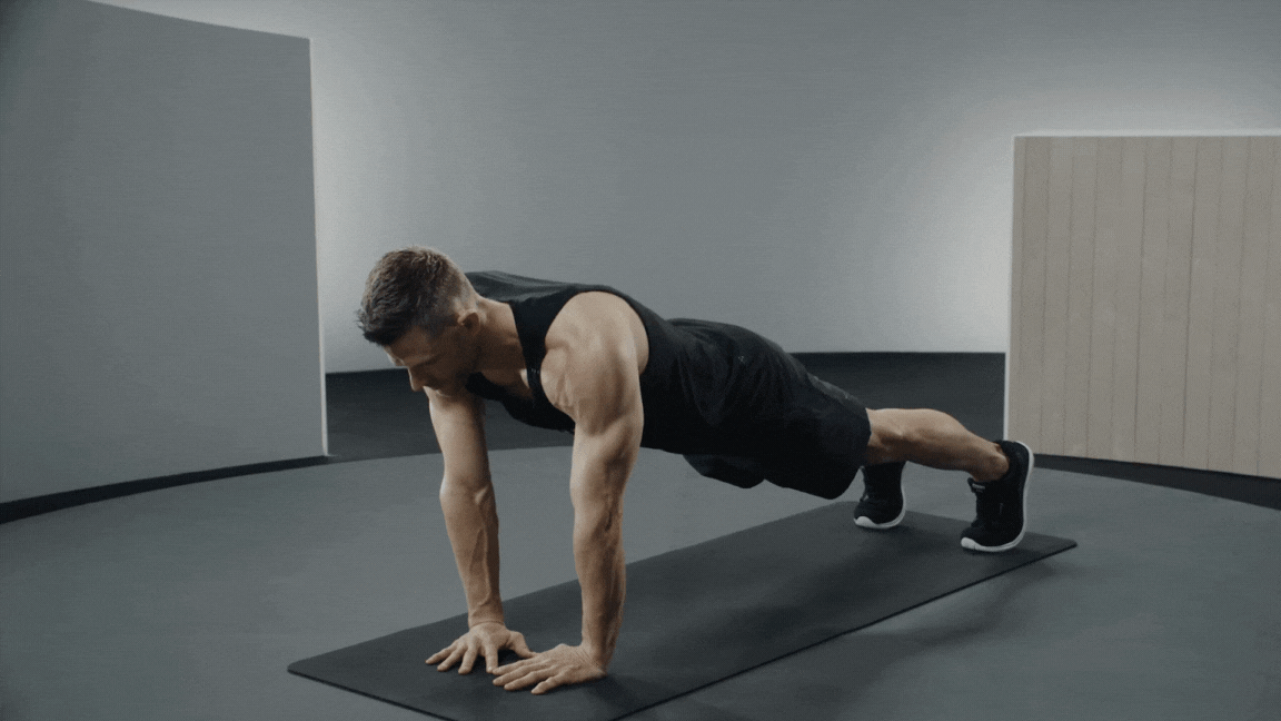 Andy Speer demonstrates a diamond push-up exercise 