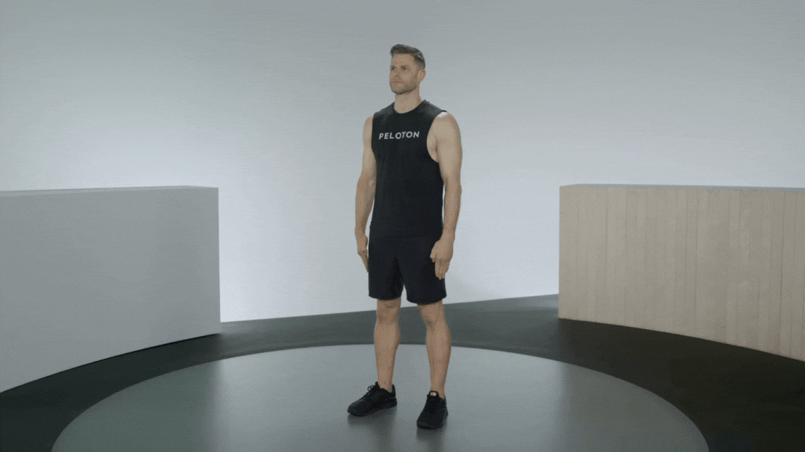 Peloton instructor Andy Speer demonstrating arm circles as a beginner bodyweight exercise