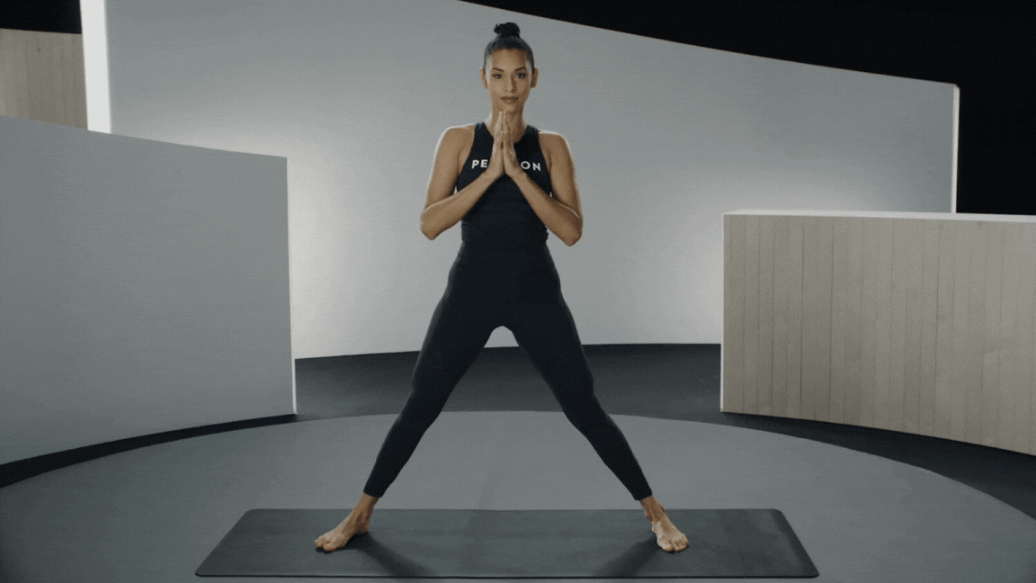 Peloton instructor Aditi Shah demonstrates Side Lunge Pose with proper form 