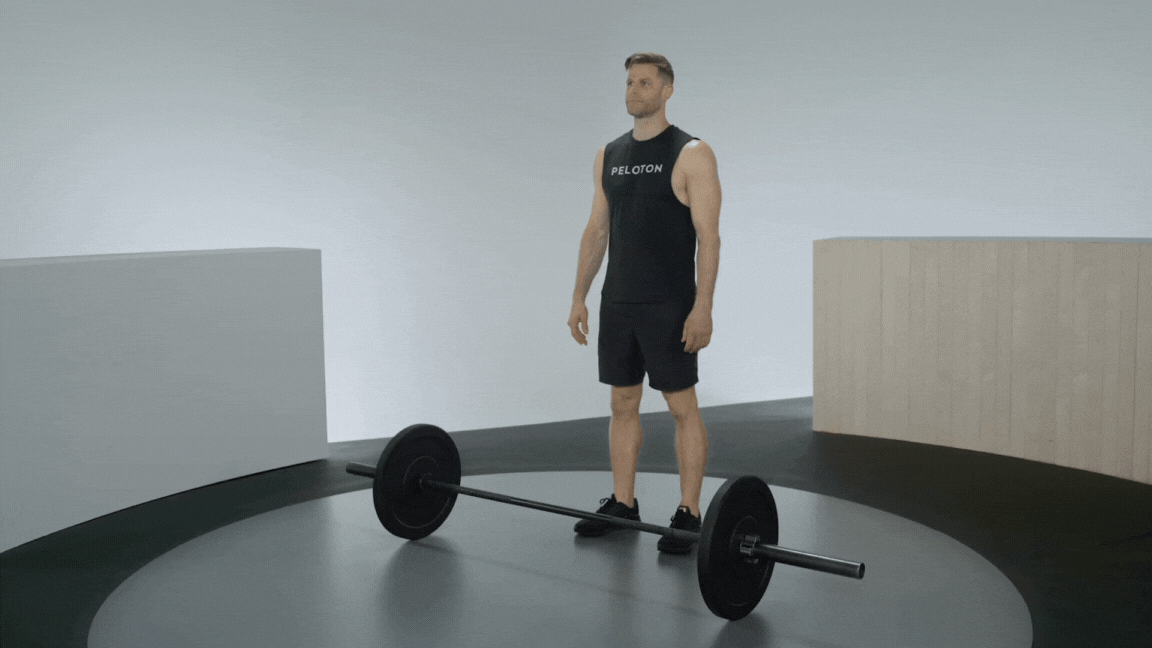 Peloton instructor Andy Speer demonstrates a barbell deadlift with proper form