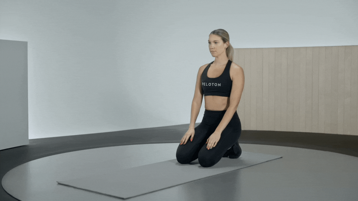 Peloton instructor Callie Gullickson demonstrates a runner's lunge cooldown exercise.