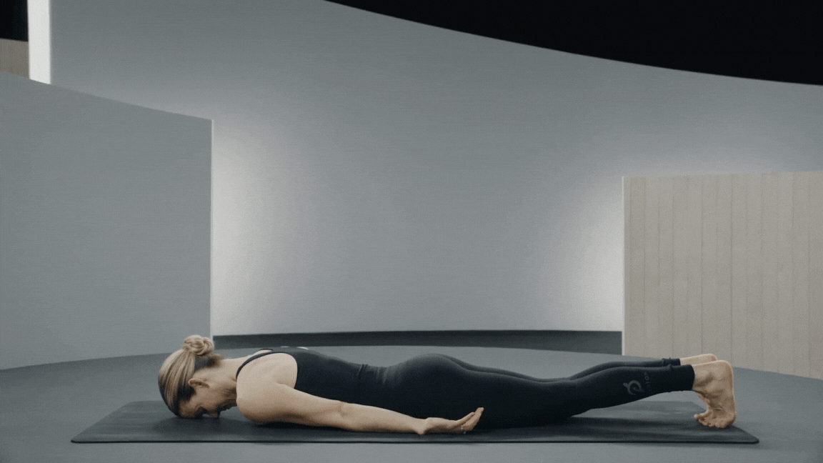 Peloton instructor Kristin McGee demonstrates yoga backbend Bow Pose with proper form 