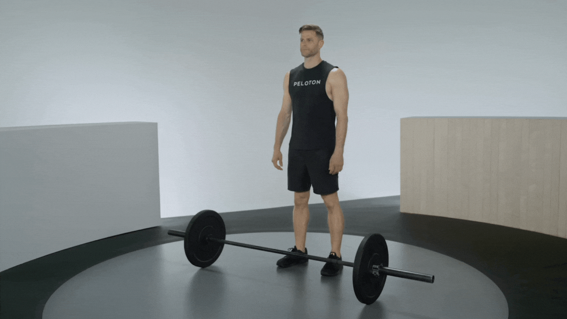 Peloton instructor Andy Speed demonstrating a barbell bent over row with proper form
