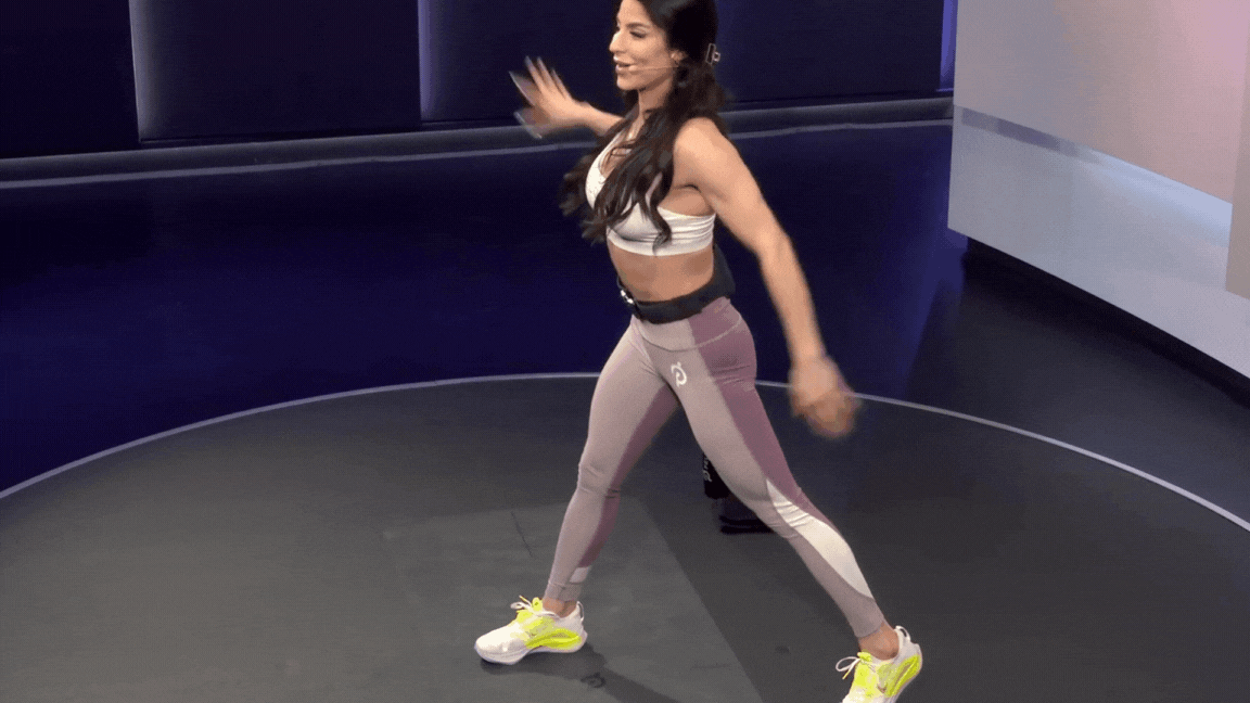 Woman demonstrates a split squat as a squat variation