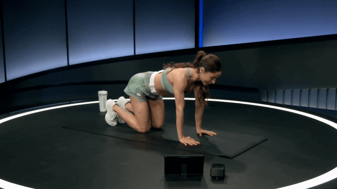 Peloton instructor Assal Arian demonstrates the bird dog core exercise for runners.