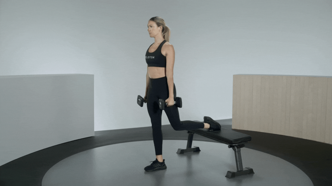 Peloton Instructor Callie Gullickson demonstrates a rear foot elevated split squat 