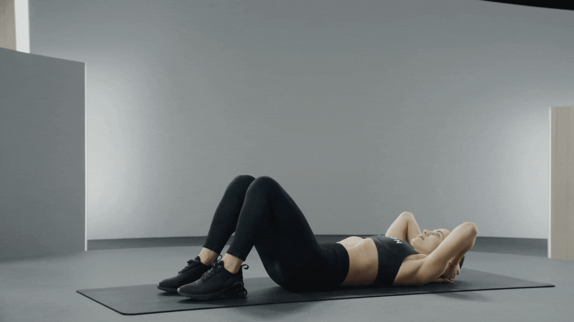Olivia Amato demonstrates how to perform a crunch exercise 