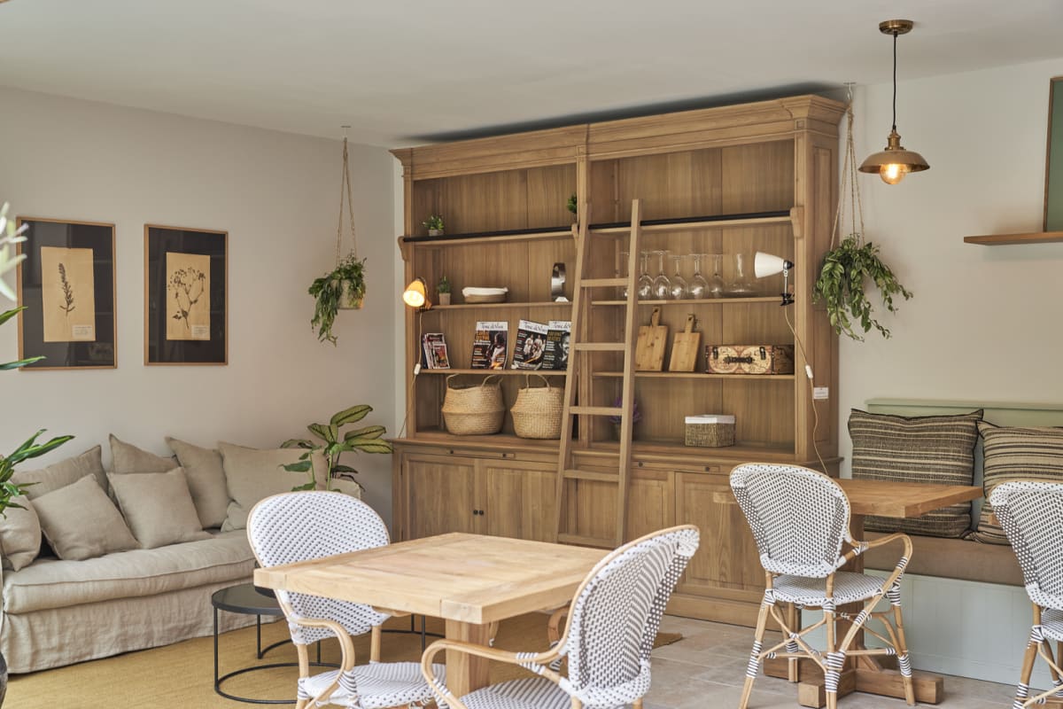 Bookshelves and tables in the shared lounge
