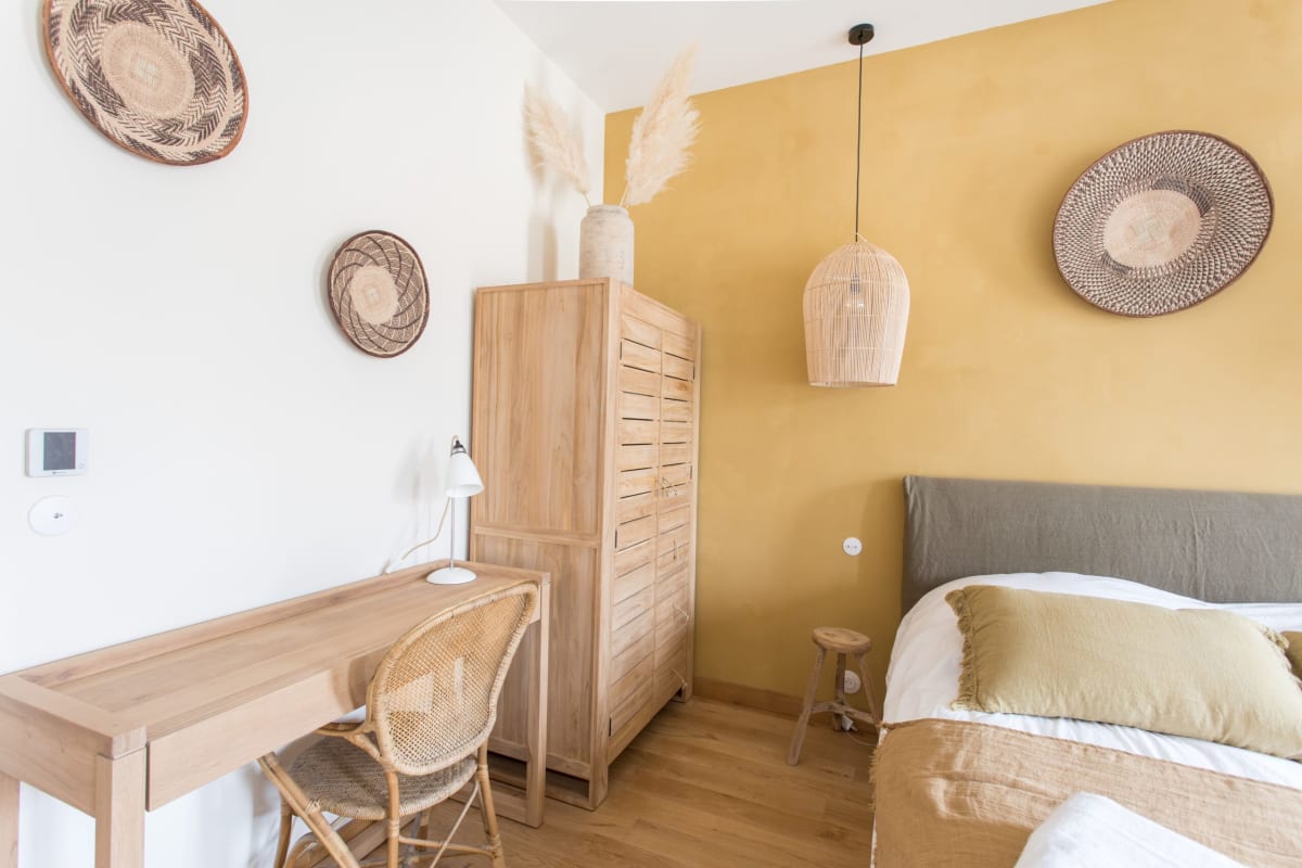 Pénate 2 — Ochre — bed and seating area