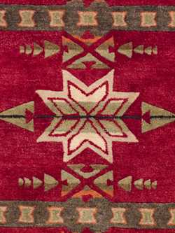 CLOSE UP OF HANDMADE GATEKEEPER RUG IN RED image number 2
