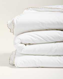 CLOSE UP FOLDED VIEW OF DOWN ALTERNATIVE COMFORTER IN WHITE image number 4