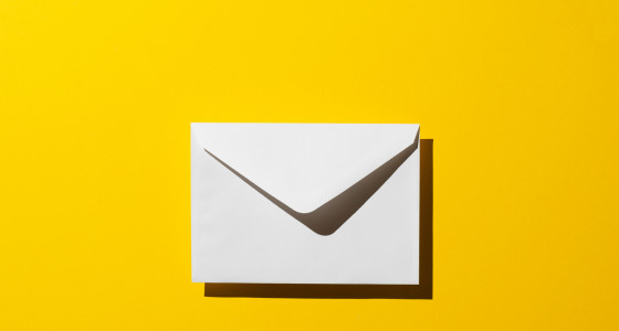 An envelope on a yellow background