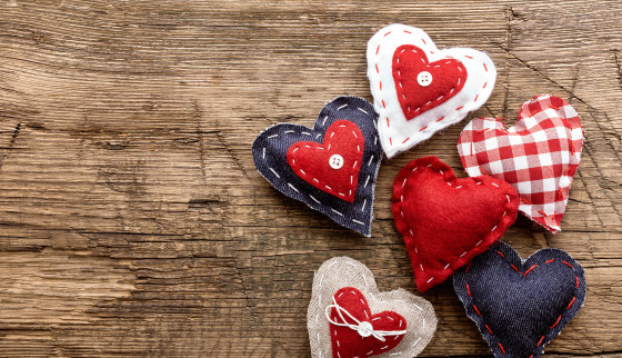 Fabric hearts on wood