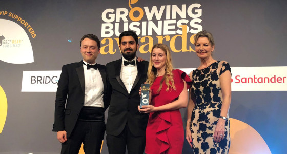 PensionBee employees collecting growing business award